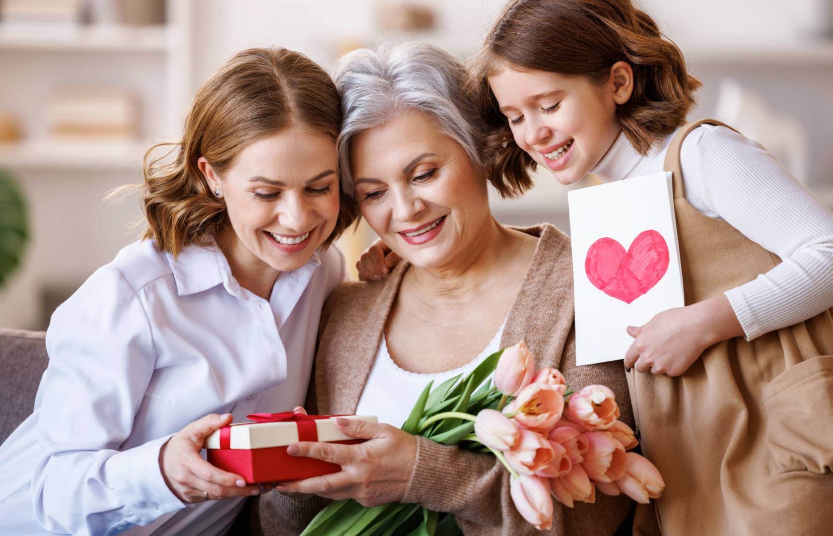 Women exchanging gifts for Mother's Day